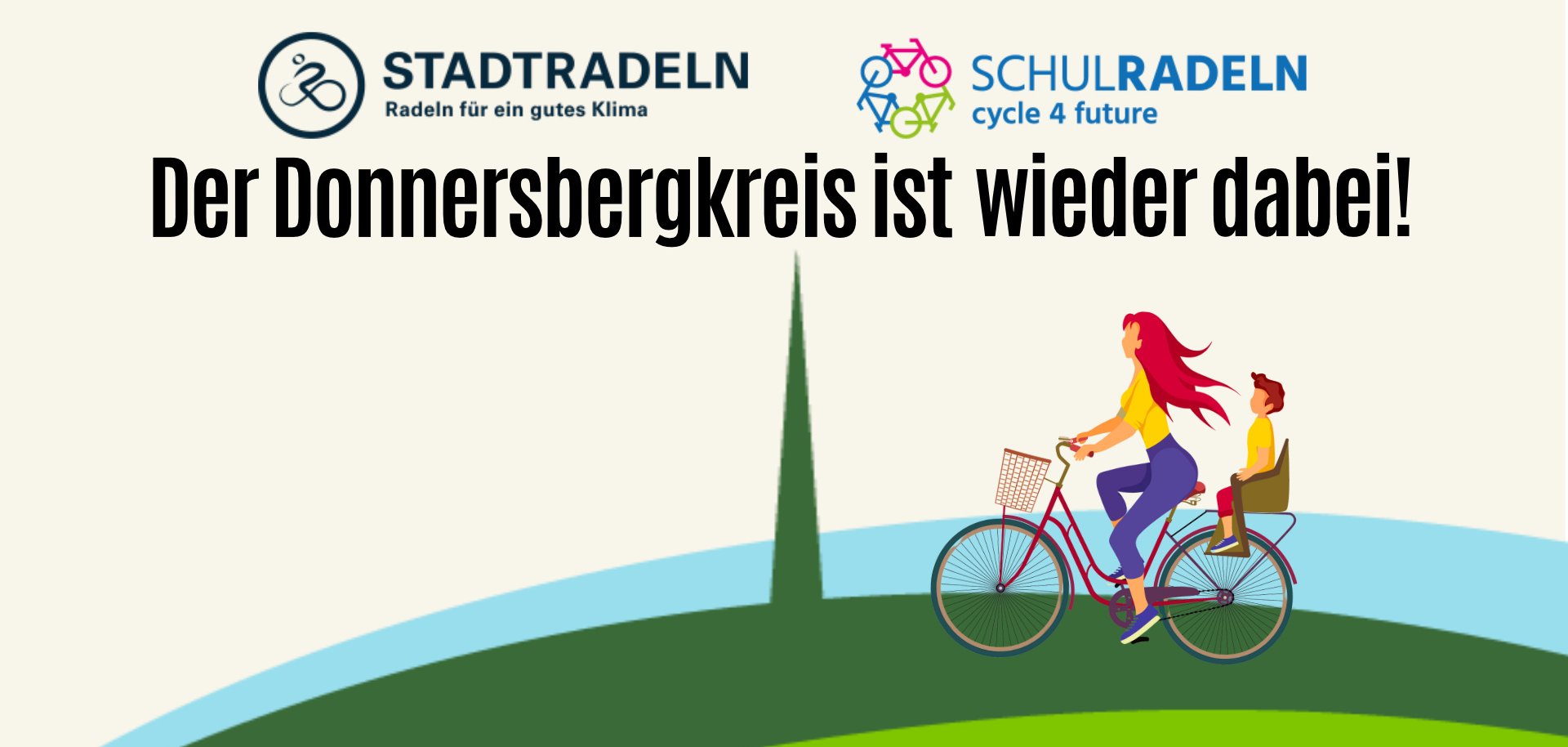 Eine Radfahrerin fährt durch das Logo des Landkreises
