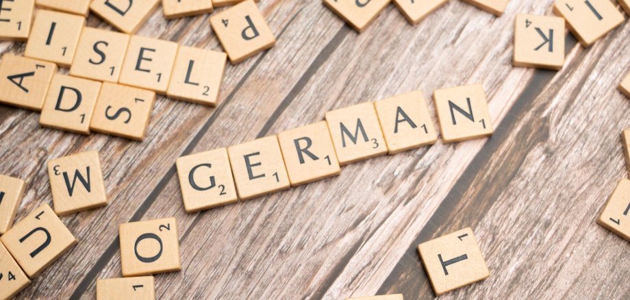 Scrabble: German Scrabble-Spielsteine, die das Wort "German" ergeben